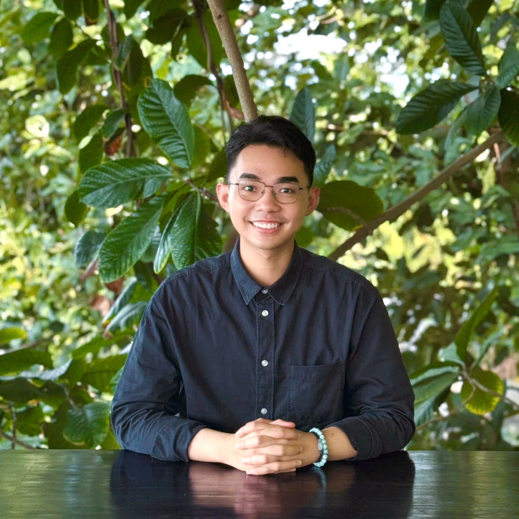 Portrait of Minh Nguyen (he/him)